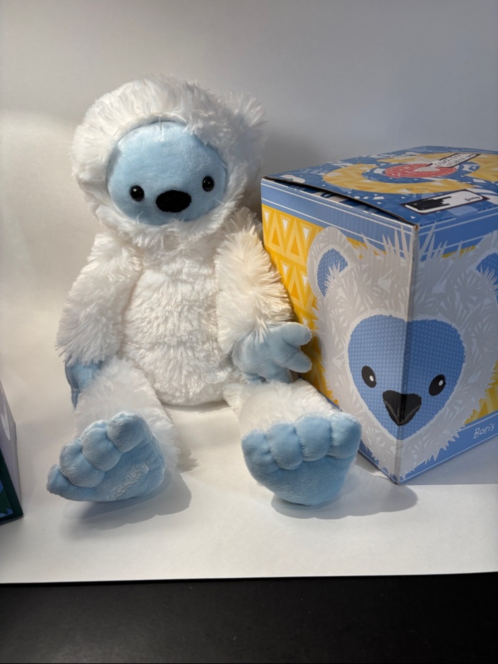 Scentsy Blue White Yellow Boris the Yeti stuffed toy.